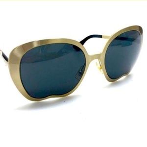 Miu Miu Big Apple Sunglasses.